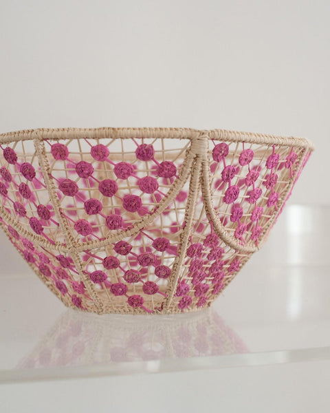 CONTEMPORARY ROUND HANDWOVEN RATTAN BOWL WITH PINK KNOTS