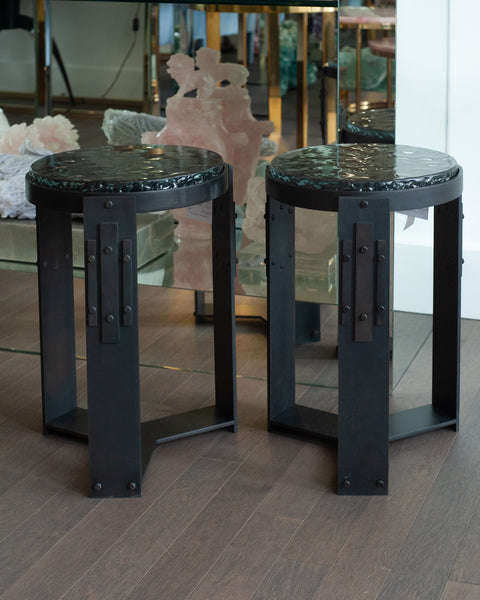 STUDIO MAISON NURITA PAIR OF SMOKED GLASS TABLES WITH BLACKENED BRASS BASES