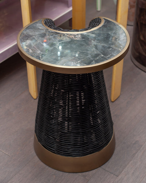 CONTEMPORARY R & Y AUGOUSTI RATTAN, BLACK QUARTZ, AND PATINATED BRASS SIDE TABLE